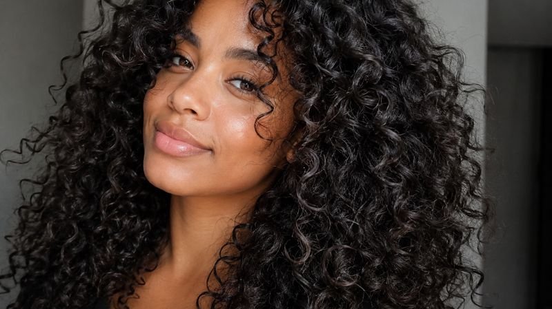 Curly hair showing moisture and frizz control