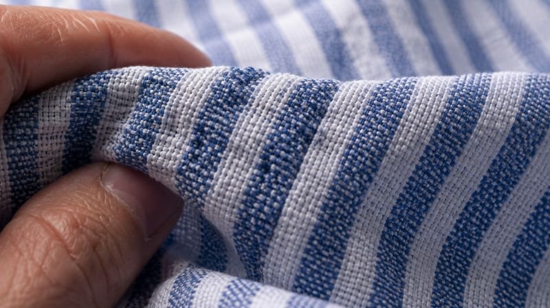 Puckered seersucker fabric showing its raised and flat woven sections