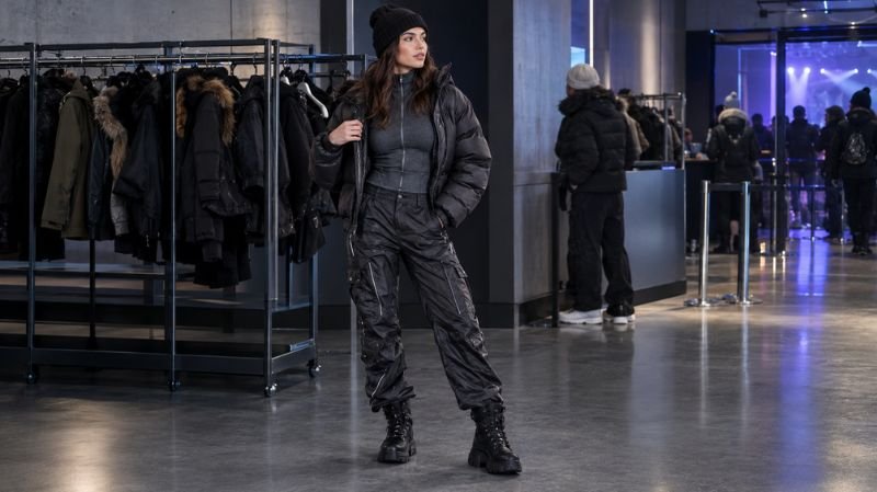 Winter Rave Outfits: Cute, Edgy & Warm Looks Layered winter rave outfit with a thermal base, metallic trousers, and a removable jacket