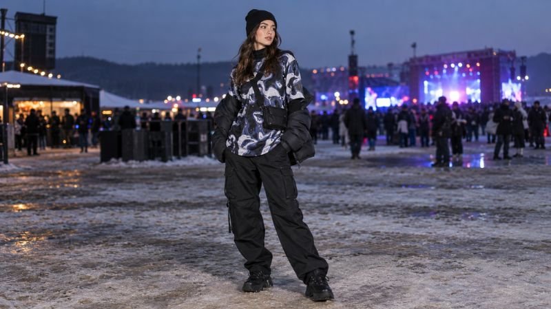 Winter Rave Outfits: Cute, Edgy & Warm Looks Winter rave streetwear with an oversized jersey, thermal layers, and cargo pants